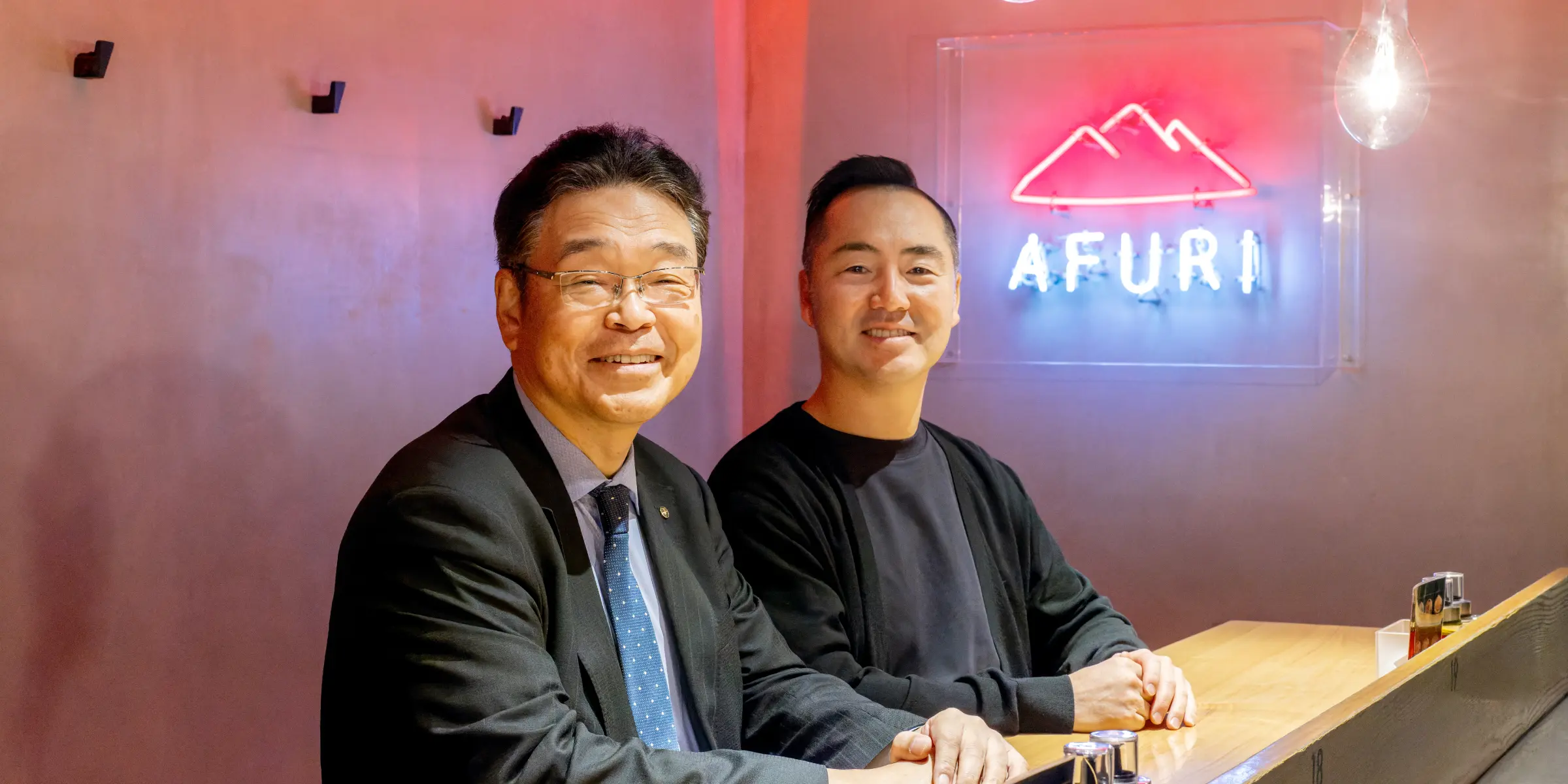 AFURI株式会社 中村比呂人氏、わかもと製薬株式会社 佐藤公彦氏の対談写真