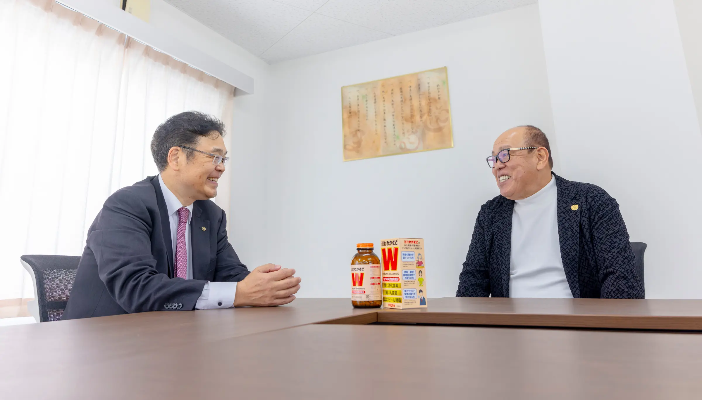株式会社一門会 上山勝也氏、わかもと製薬株式会社 佐藤公彦氏の対談写真